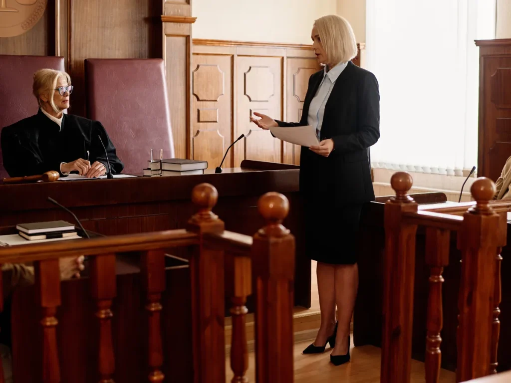 a personal accident lawyer woman standing in a courtroom
