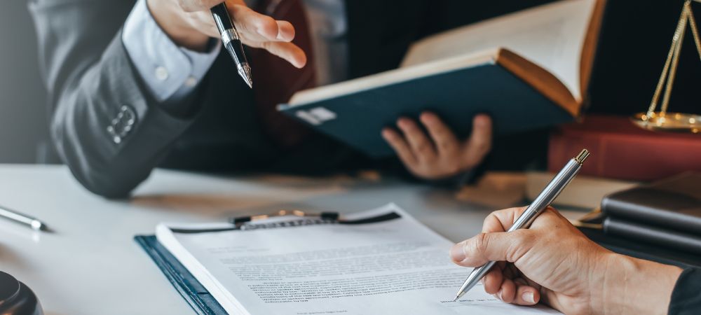 Houston Personal Injury Attorney: Your Legal Advocate 2 Houston Personal Injury Attorney meeting with a client to discuss their personal injury case
