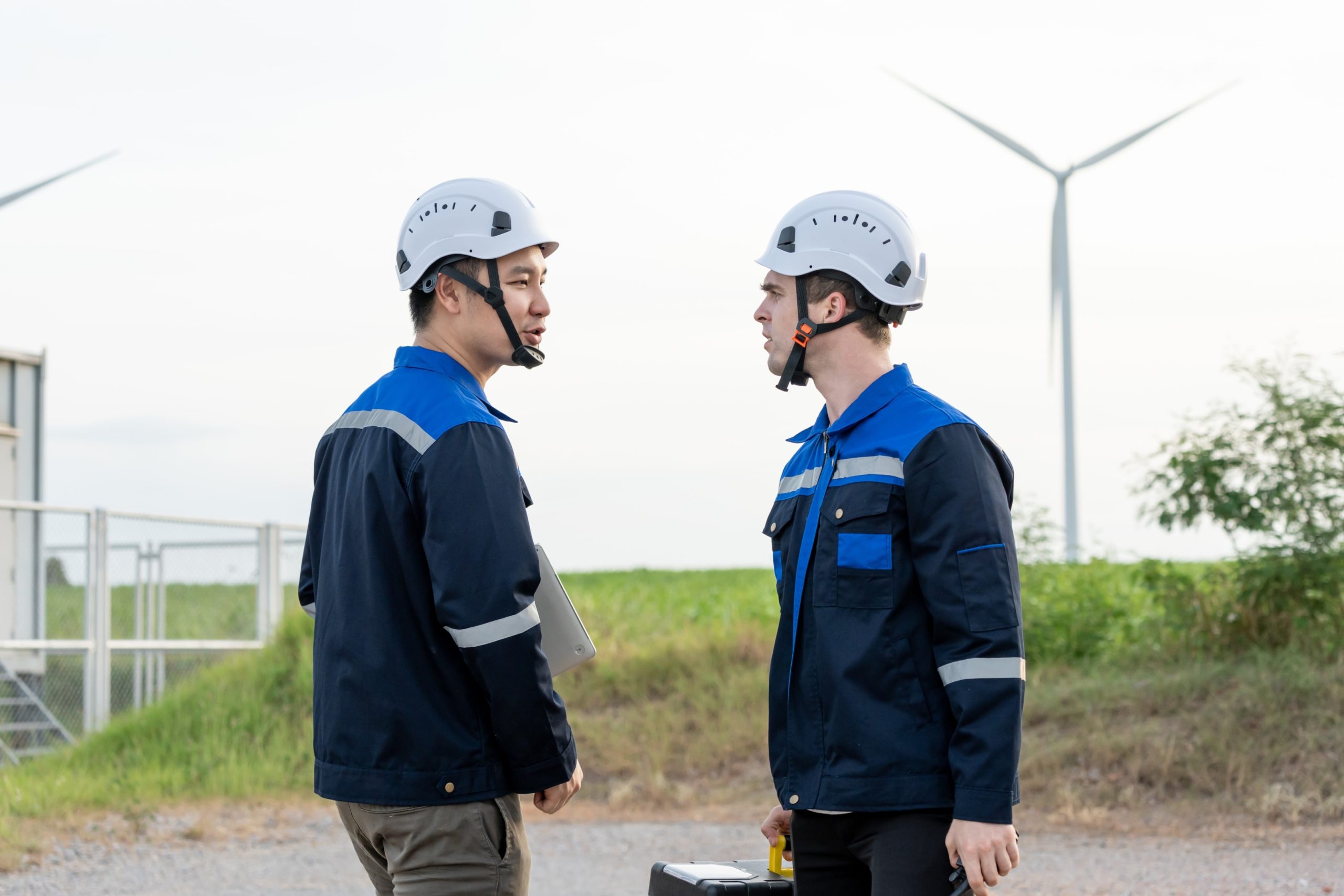 Men Talking at wind farm