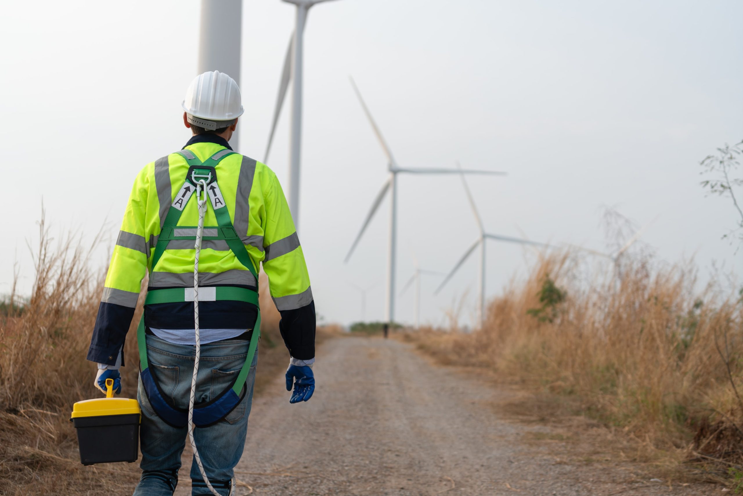 Man working on wind turbines